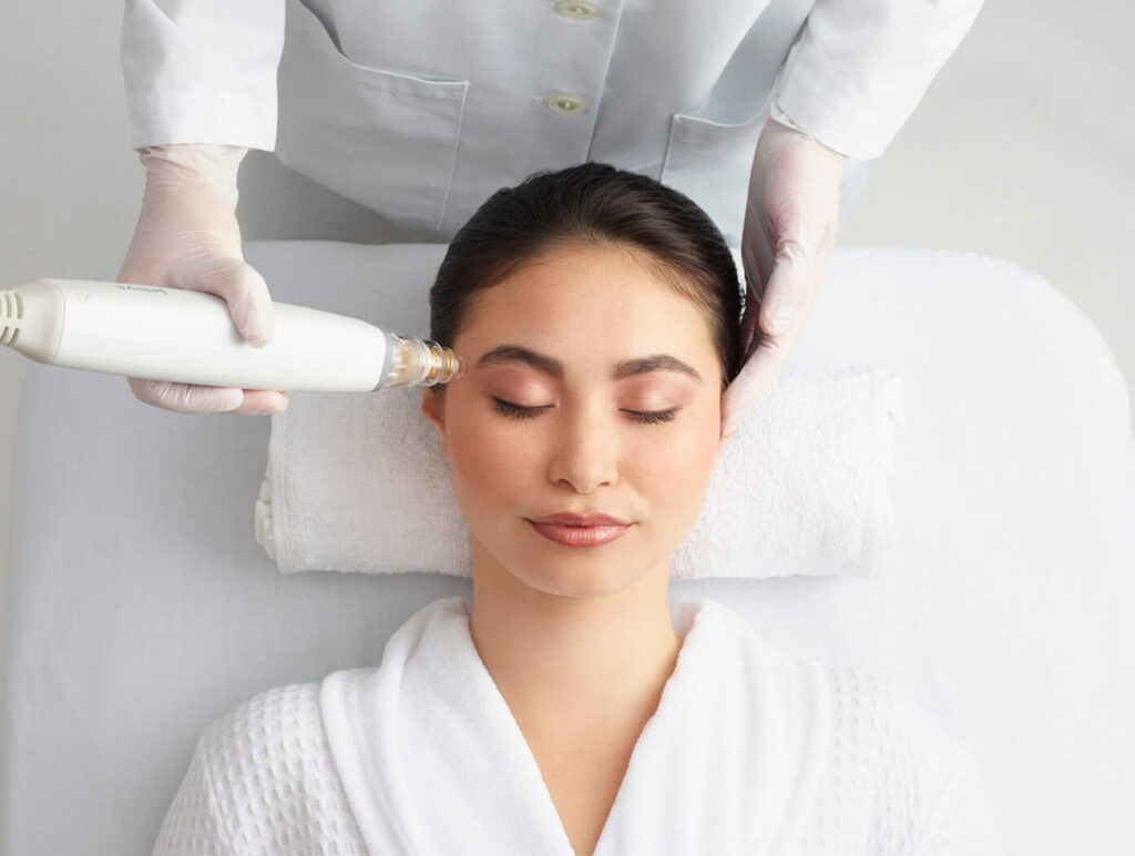 A young woman undergoes radiofrequency treatment for dry eye relief.