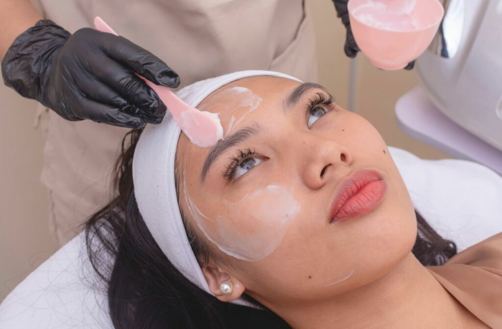 A person's face is prepped with a layer of conductive gel for their Tempsure Envi treatment.